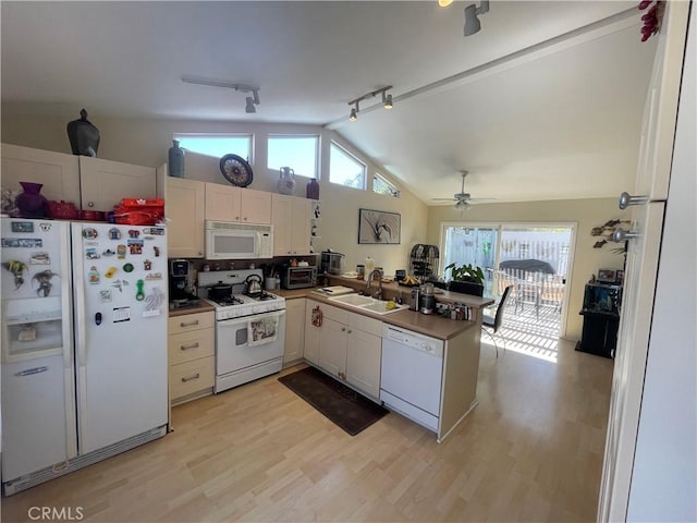 927 W 6th St, San Pedro, CA 90731 - kitchen featuring white appliances, lofted ceiling, a peninsula, light wood-type flooring, and a ceiling fan