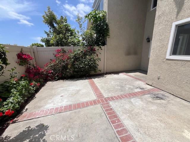45 Golden Glen St Unit 75, Irvine, CA 92604 - fenced backyard with a patio area