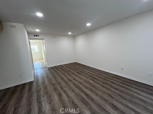 45 Golden Glen St Unit 75, Irvine, CA 92604 - unfurnished room with recessed lighting, dark wood-type flooring, and baseboards