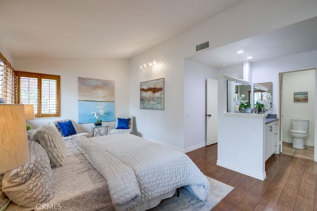 7712 Rockybrook Way, Stanton, CA 90680 - bedroom with lofted ceiling, dark wood finished floors, baseboards, ensuite bathroom, and recessed lighting