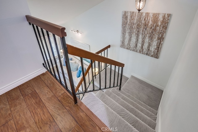 7712 Rockybrook Way, Stanton, CA 90680 - staircase featuring baseboards and wood finished floors