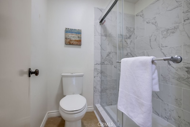 7712 Rockybrook Way, Stanton, CA 90680 - bathroom featuring toilet, a shower stall, and baseboards