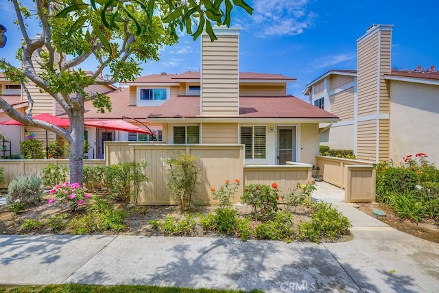 7712 Rockybrook Way, Stanton, CA 90680 - view of front of house with a chimney