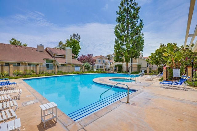 7712 Rockybrook Way, Stanton, CA 90680 - community pool featuring a patio area and a residential view
