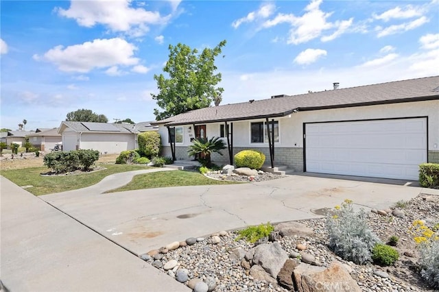 1505 Cypress Ln, Lemoore, CA 93245 - single story home featuring concrete driveway, a garage, brick siding, and stucco siding