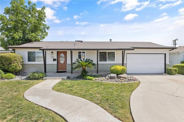 1505 Cypress Ln, Lemoore, CA 93245 - ranch-style home with driveway, an attached garage, a front yard, and stucco siding