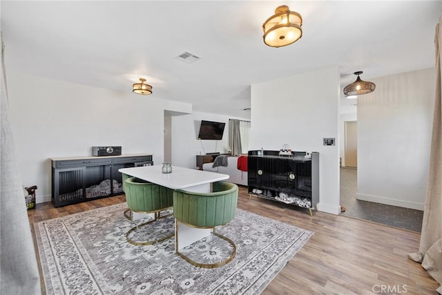 1505 Cypress Ln, Lemoore, CA 93245 - living room featuring wood finished floors and baseboards