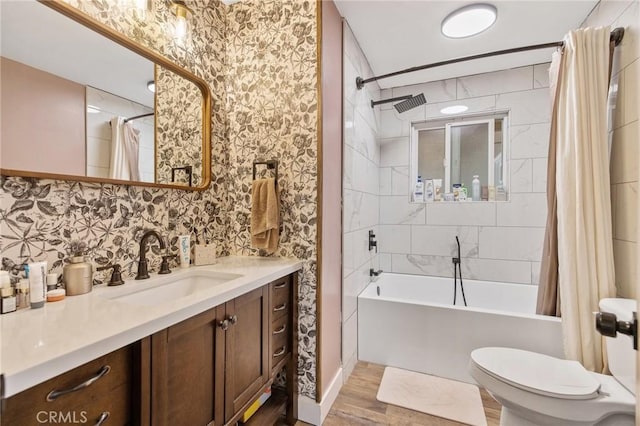 1505 Cypress Ln, Lemoore, CA 93245 - bathroom with shower / bathtub combination with curtain, vanity, toilet, wood finished floors, and wallpapered walls