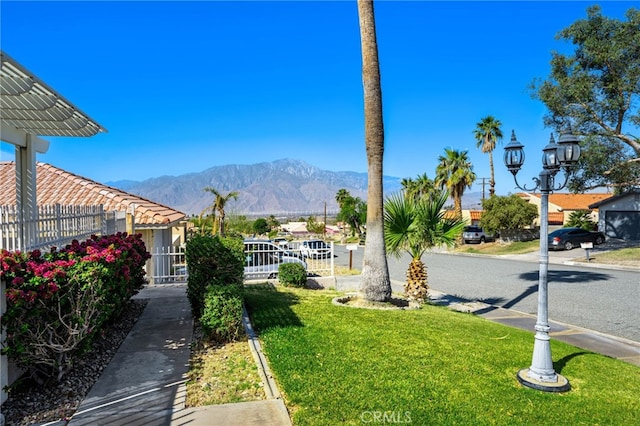 9552 Palm Dr, Desert Hot Springs, CA 92240 - view of grassy yard featuring a mountain view