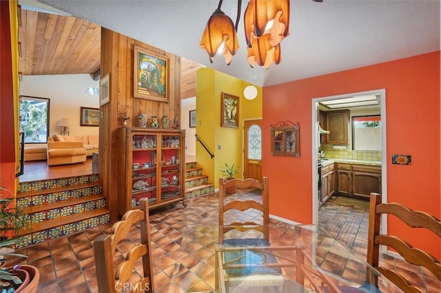 537 3rd St, Manhattan Beach, CA 90266 - dining room featuring vaulted ceiling and stairway
