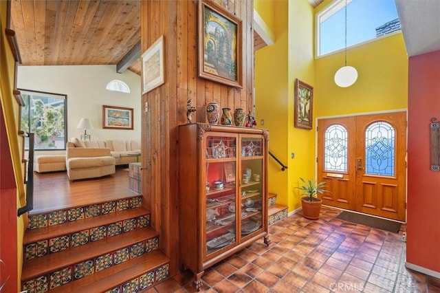 537 3rd St, Manhattan Beach, CA 90266 - entryway with high vaulted ceiling, a wood ceiling with exposed beams, and stairway
