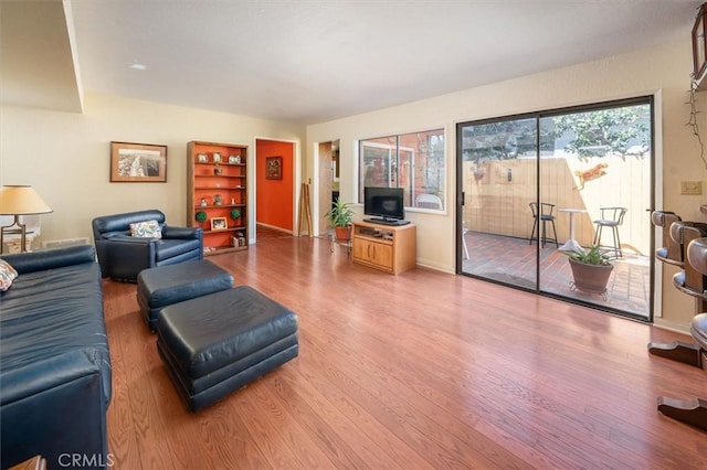 537 3rd St, Manhattan Beach, CA 90266 - living room featuring wood finished floors and baseboards