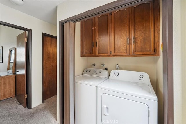 537 3rd St, Manhattan Beach, CA 90266 - washroom featuring washer and clothes dryer, cabinet space, and light colored carpet