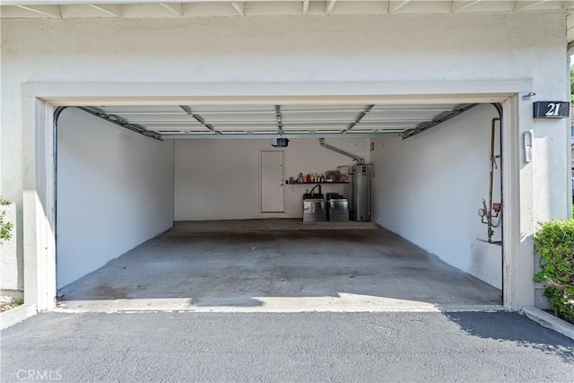 5847 E Rocking Horse Way Unit 21, Orange, CA 92869 - garage featuring secured water heater