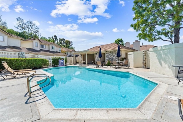 5847 E Rocking Horse Way Unit 21, Orange, CA 92869 - view of swimming pool featuring a patio