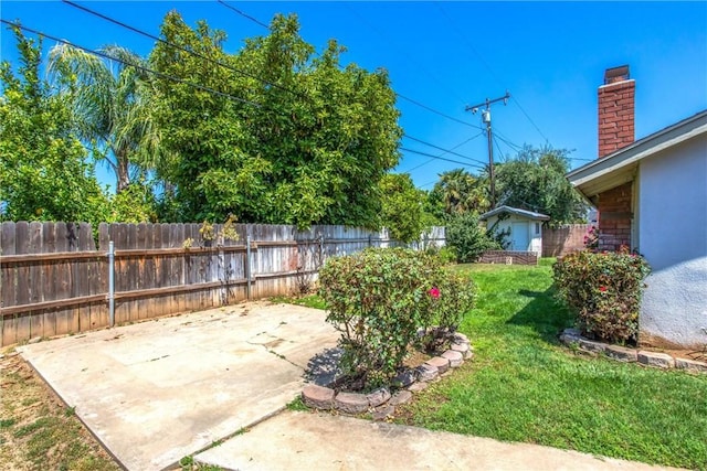 1210 3rd St, Calimesa, CA 92320 - fenced backyard with a patio