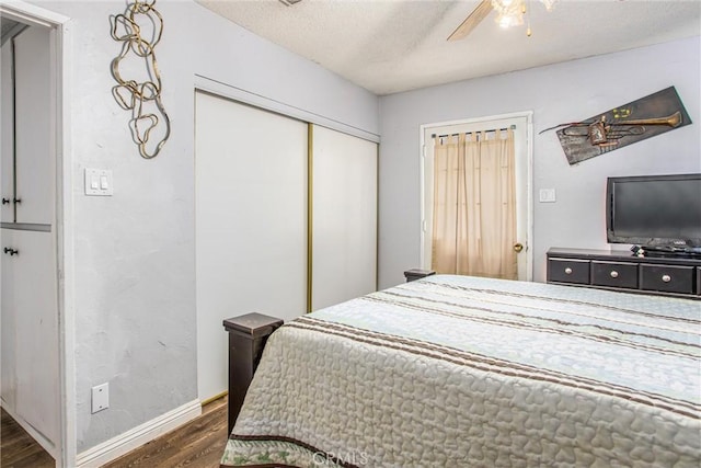 1210 3rd St, Calimesa, CA 92320 - bedroom with dark wood-style floors, a closet, ceiling fan, and a textured ceiling