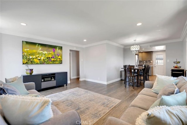 3879 Big Dalton Ave, Baldwin Park, CA 91706 - living room with recessed lighting, baseboards, light wood-style floors, crown molding, and a chandelier