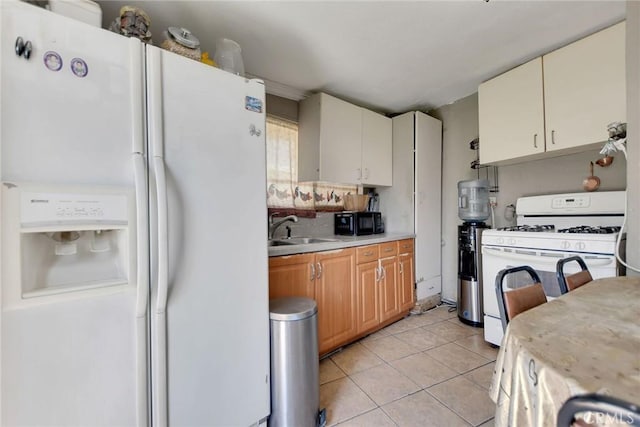 3879 Big Dalton Ave, Baldwin Park, CA 91706 - kitchen featuring white appliances, light countertops, a sink, light tile patterned floors, and backsplash