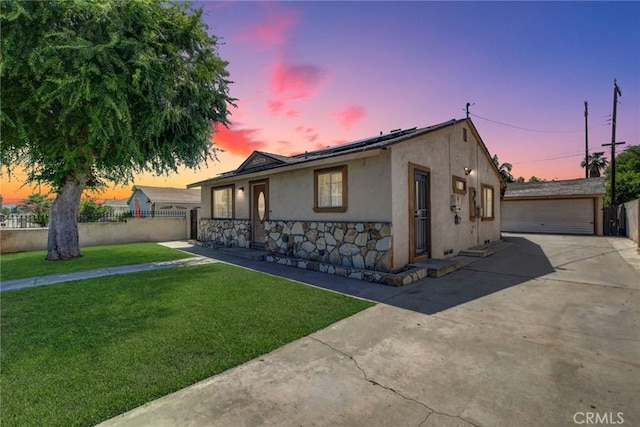 3879 Big Dalton Ave, Baldwin Park, CA 91706 - ranch-style house with stucco siding, solar panels, an outbuilding, stone siding, and a garage
