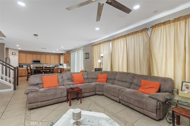 15691 Cherry Leaf Ln, Fontana, CA 92336 - living room with light tile patterned floors, a ceiling fan, and recessed lighting