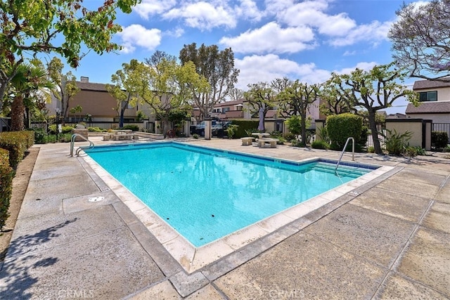 9738 Walker St Unit 1, Cypress, CA 90630 - community pool featuring a patio and a residential view