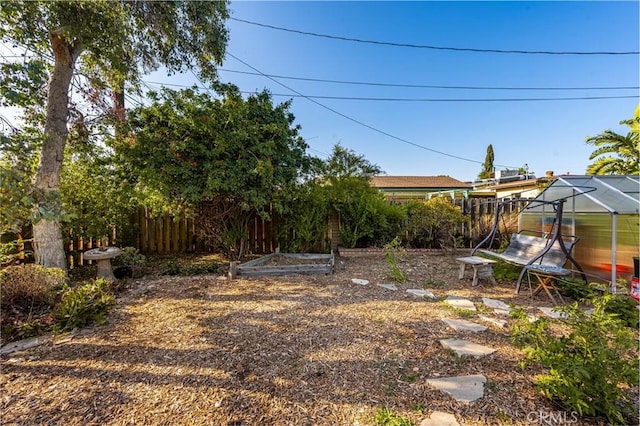 950 N Laurel Dr, Orange, CA 92867 - view of yard with a vegetable garden and a greenhouse