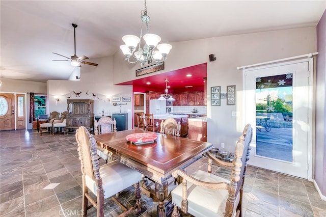 50806 Bramble Ln, Squaw Valley, CA 93675 - dining room featuring a chandelier, a ceiling fan, stone finish floors, and high vaulted ceiling