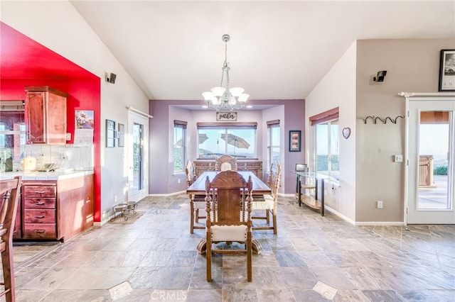 50806 Bramble Ln, Squaw Valley, CA 93675 - dining area featuring a chandelier and stone tile floors