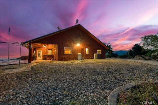 50806 Bramble Ln, Squaw Valley, CA 93675 - view of home's exterior with a cooling unit and a patio