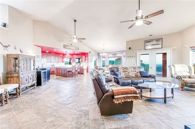 50806 Bramble Ln, Squaw Valley, CA 93675 - living room featuring a ceiling fan, french doors, high vaulted ceiling, and a chandelier