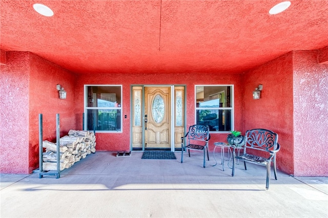 50806 Bramble Ln, Squaw Valley, CA 93675 - property entrance featuring stucco siding and a porch
