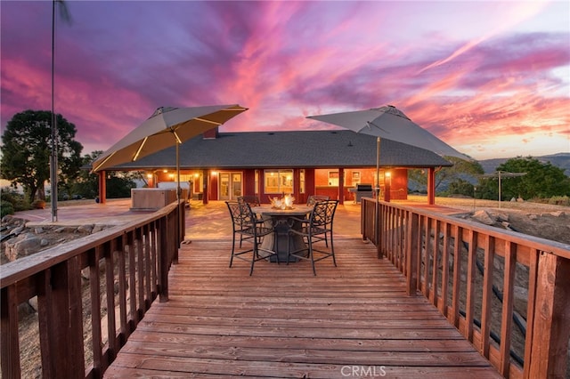 50806 Bramble Ln, Squaw Valley, CA 93675 - deck at dusk featuring outdoor dining area