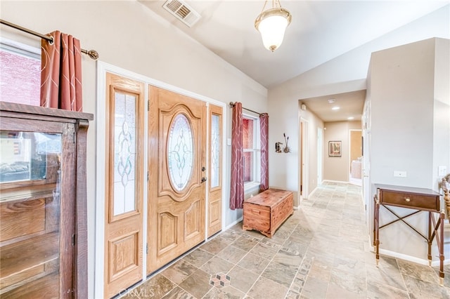 50806 Bramble Ln, Squaw Valley, CA 93675 - entryway featuring lofted ceiling and light stone finish flooring