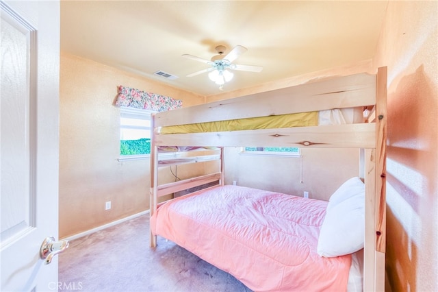 50806 Bramble Ln, Squaw Valley, CA 93675 - carpeted bedroom with multiple windows and a ceiling fan