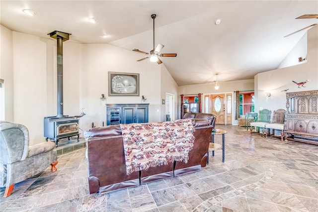 50806 Bramble Ln, Squaw Valley, CA 93675 - living room with a wood stove, ceiling fan, and high vaulted ceiling