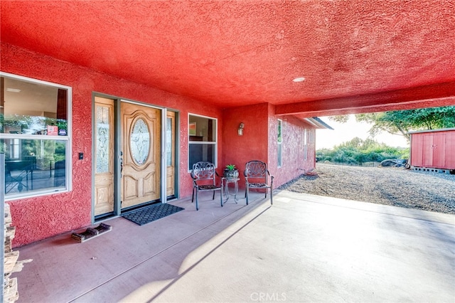 50806 Bramble Ln, Squaw Valley, CA 93675 - property entrance featuring stucco siding and a patio