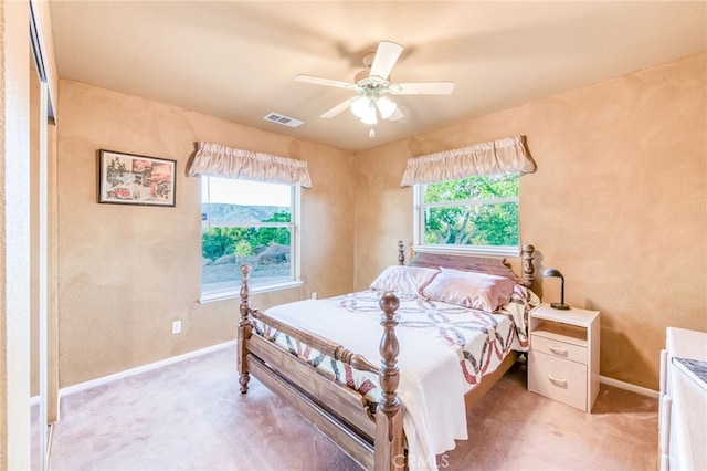 50806 Bramble Ln, Squaw Valley, CA 93675 - bedroom with light carpet, a ceiling fan, and a textured wall
