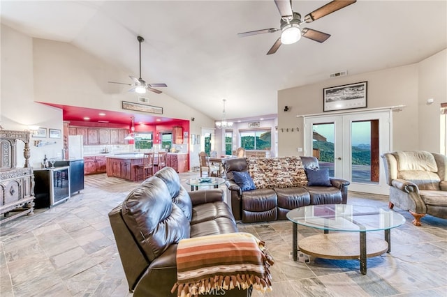 50806 Bramble Ln, Squaw Valley, CA 93675 - living room featuring a ceiling fan, lofted ceiling, beverage cooler, french doors, and a chandelier