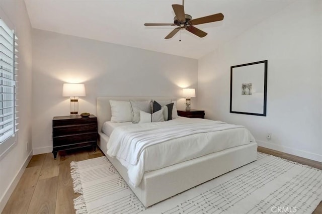 27865 Espinoza, Mission Viejo, CA 92692 - bedroom with light wood finished floors, baseboards, lofted ceiling, and ceiling fan