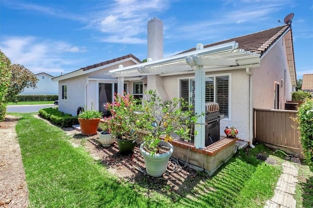 27865 Espinoza, Mission Viejo, CA 92692 - back of house featuring a pergola, stucco siding, and a tile roof