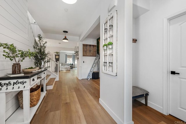 25444 Red Hawk Rd, Corona, CA 92883 - hall featuring stairs, light wood-style floors, and baseboards