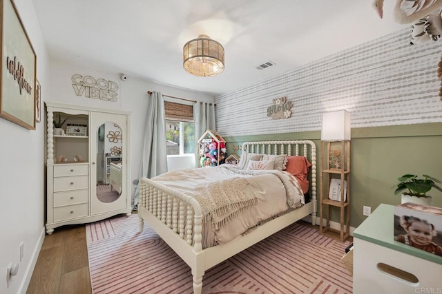 25444 Red Hawk Rd, Corona, CA 92883 - bedroom with wallpapered walls, baseboards, and wood finished floors