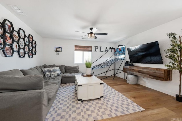 25444 Red Hawk Rd, Corona, CA 92883 - living area with a ceiling fan, light wood-type flooring, and baseboards
