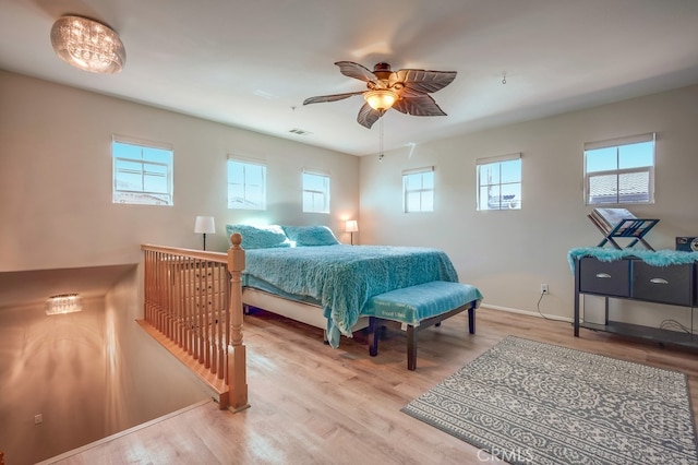 39723 Columbia Union Dr Unit A, Murrieta, CA 92563 - bedroom featuring wood finished floors, baseboards, and a ceiling fan
