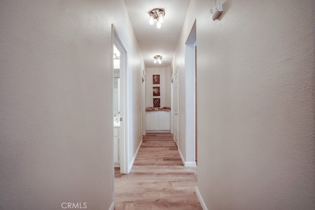 39723 Columbia Union Dr Unit A, Murrieta, CA 92563 - hall featuring light wood-style flooring and baseboards