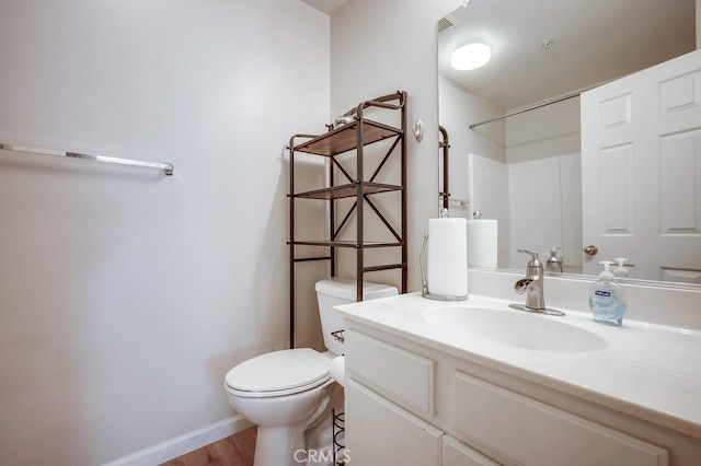 39723 Columbia Union Dr Unit A, Murrieta, CA 92563 - bathroom with toilet, vanity, a shower, and wood finished floors