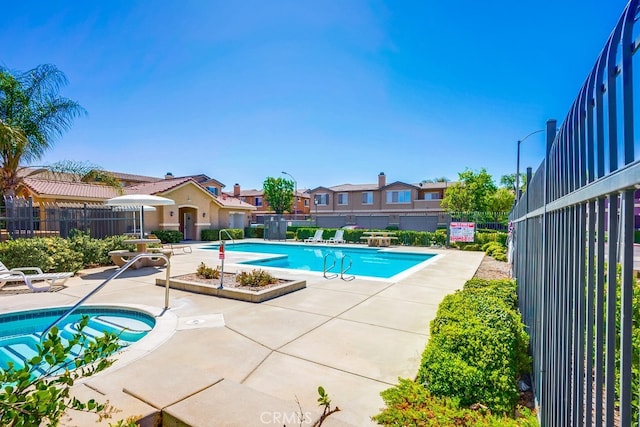 39723 Columbia Union Dr Unit A, Murrieta, CA 92563 - community pool featuring a patio area and a hot tub