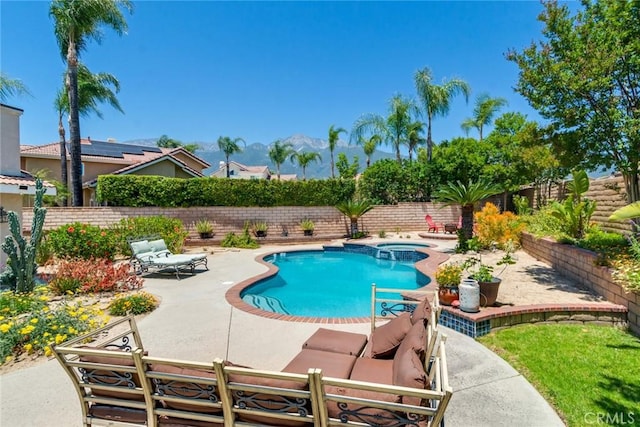 6909 Stanislaus Pl, Rancho Cucamonga, CA 91701 - view of swimming pool featuring a patio area, a fenced backyard, and a pool with connected hot tub