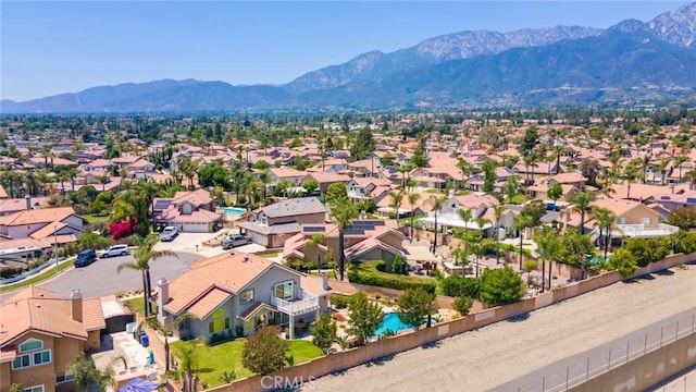 6909 Stanislaus Pl, Rancho Cucamonga, CA 91701 - aerial perspective of suburban area with a mountain backdrop